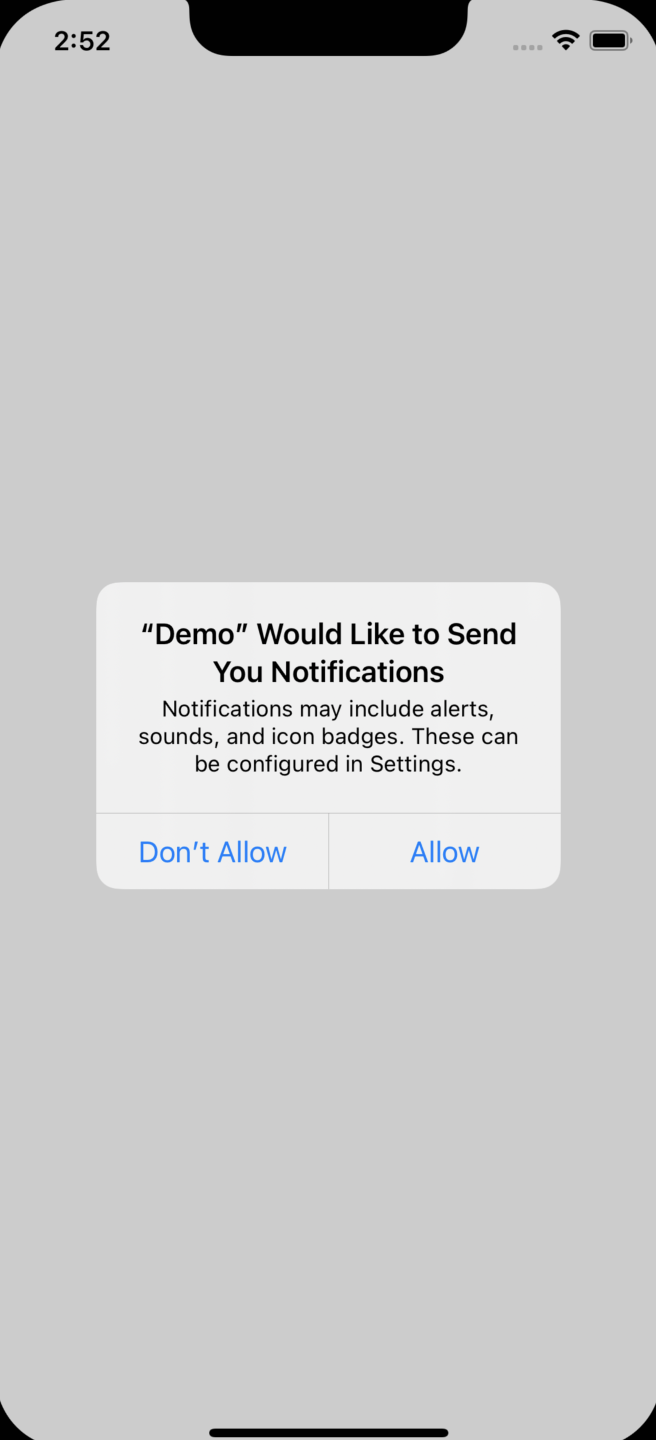 Screenshot aplikasi iOS yang dipangkas yang meminta izin untuk mengirim notifikasi